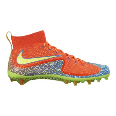 orange and green football cleats