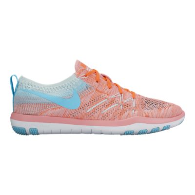 light blue and pink nike shoes