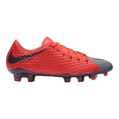 red and grey soccer cleats