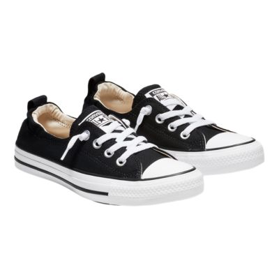 women converse shoreline