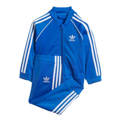 light blue adidas track top
