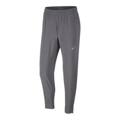 nike essential woven pants