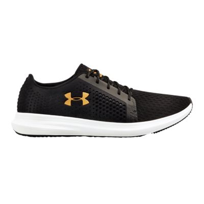 gold and black under armour shoes
