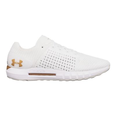 gold and white under armour shoes