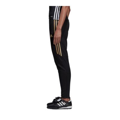 black and gold tiro pants