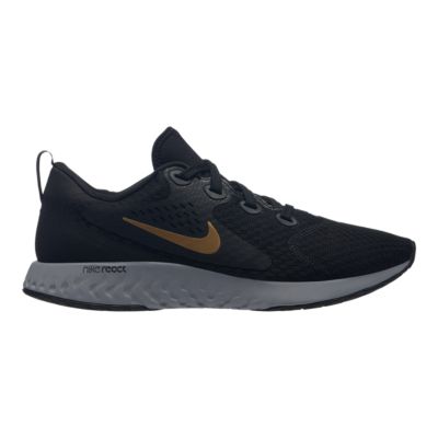 nike running legend react trainers in black and gold