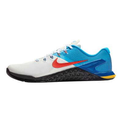 nike training metcon sneakers in white and orange