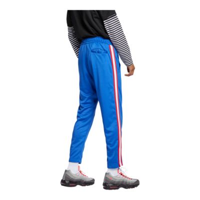 nike tribute track pants blue