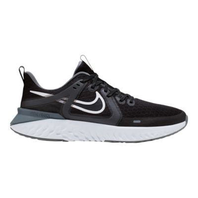 nike running legend react trainers in black & white