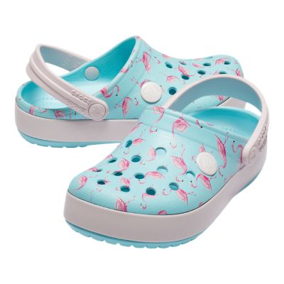 blue crocs with flamingos