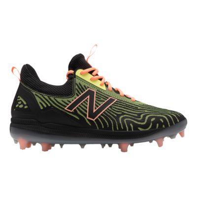 black and yellow new balance cleats