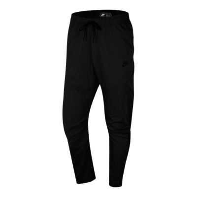 nike club woven pants