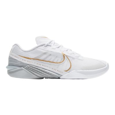 nike metcon gold and white