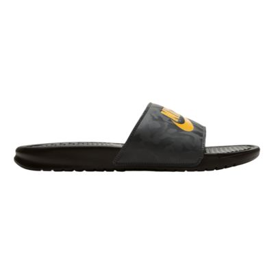 black and gold nike slippers